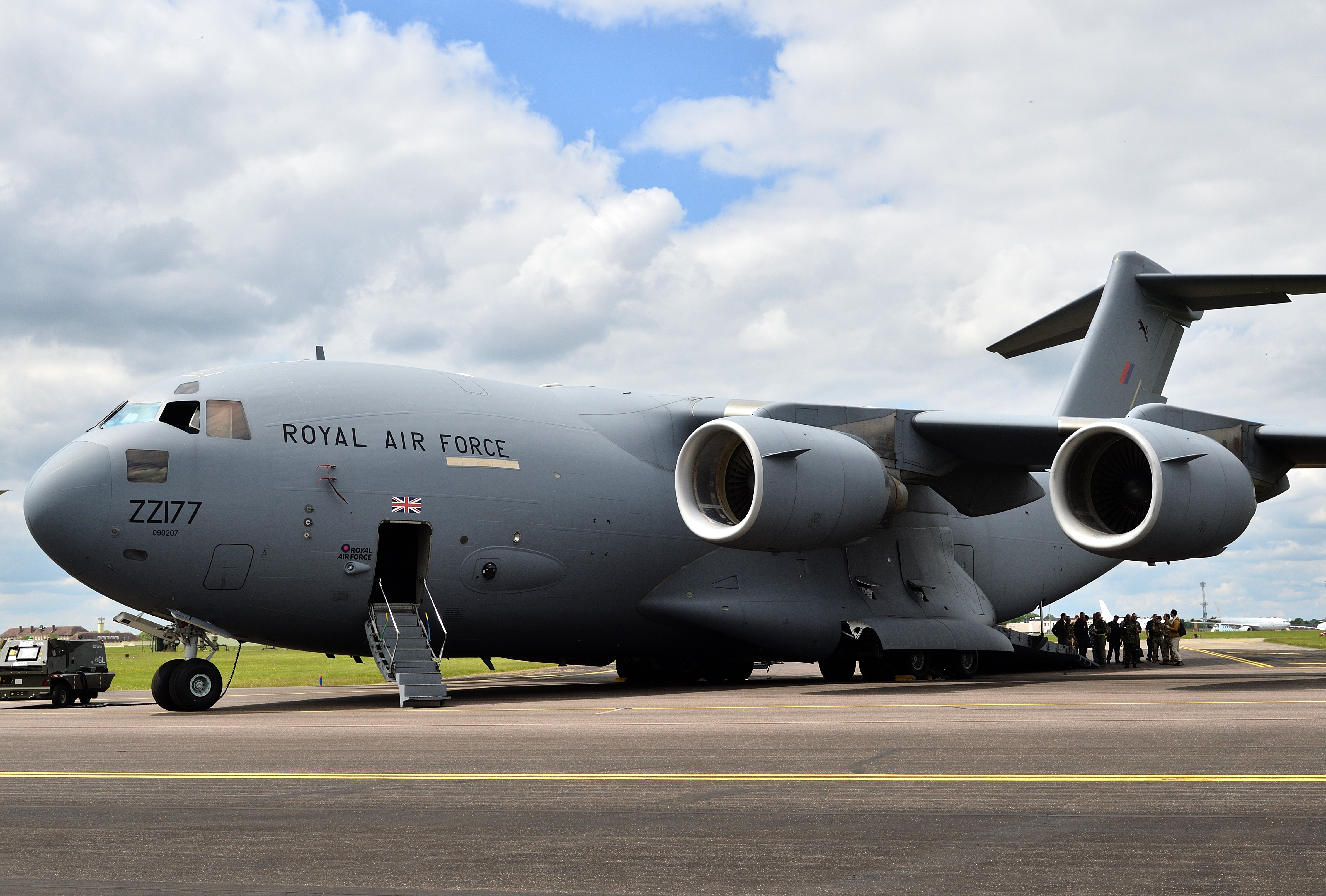 Image shows an RAF C-17 aircraft on the ground.